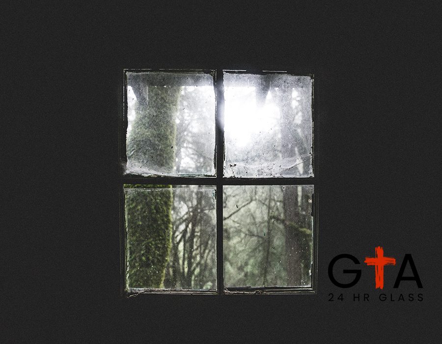 A beautiful shot of an old dirty cabin window