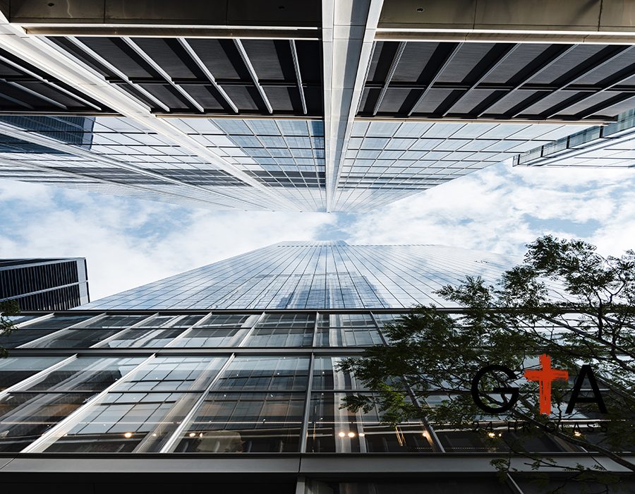 bottom-view-skyscrapers-sunny-day