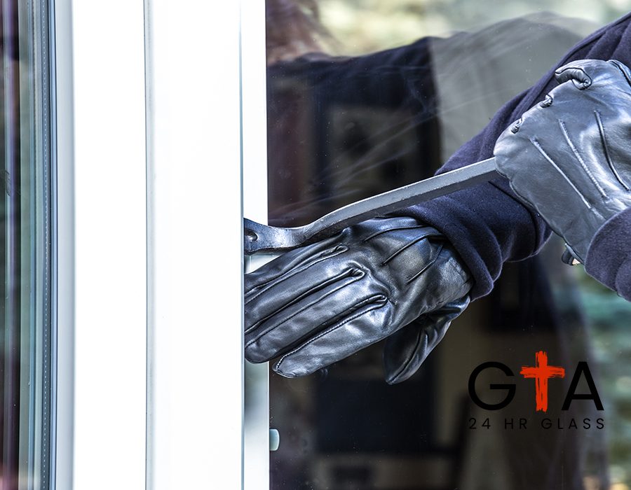 cropped-hands-burglar-opening-window