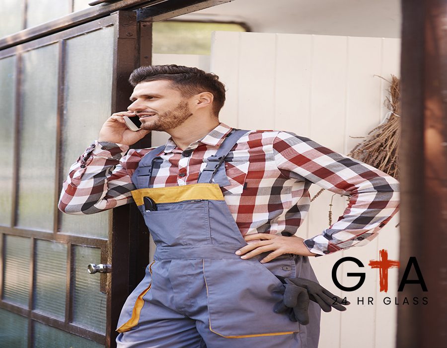 Gardener talking by mobile phone
