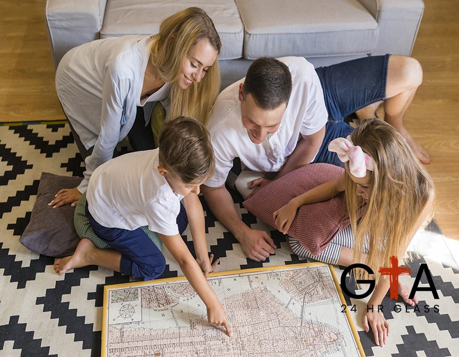high-view-family-looking-blue-print
