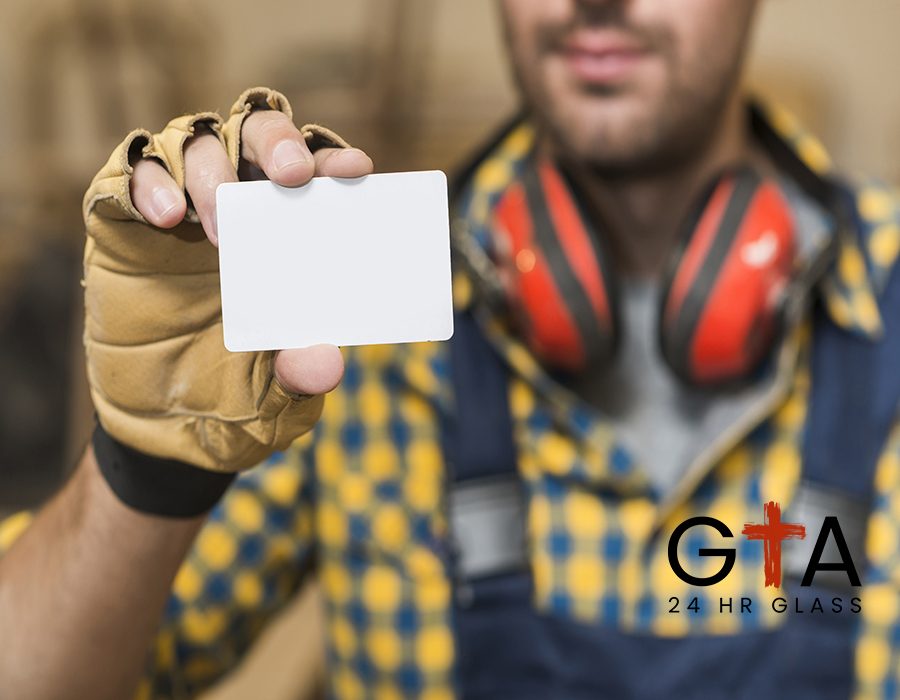 male-carpenter-showing-blank-white-visiting-card