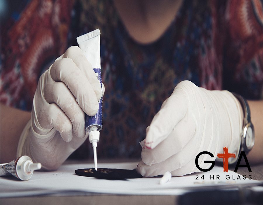 Master working on crafts with glue. High quality photo
