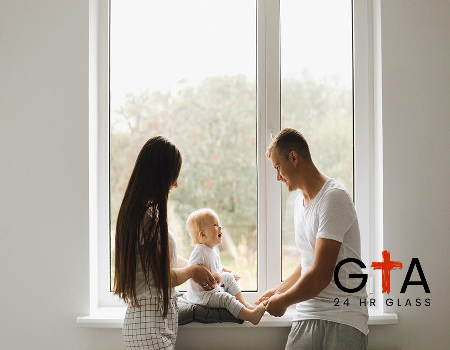 Mom and dad play with their little son