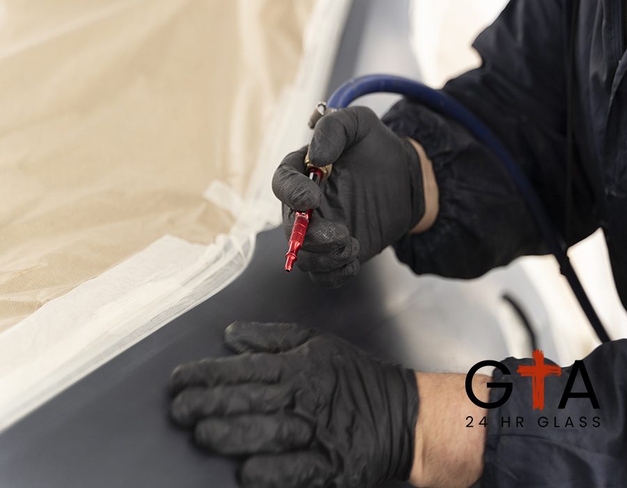 service-worker-painting-car-auto-service
