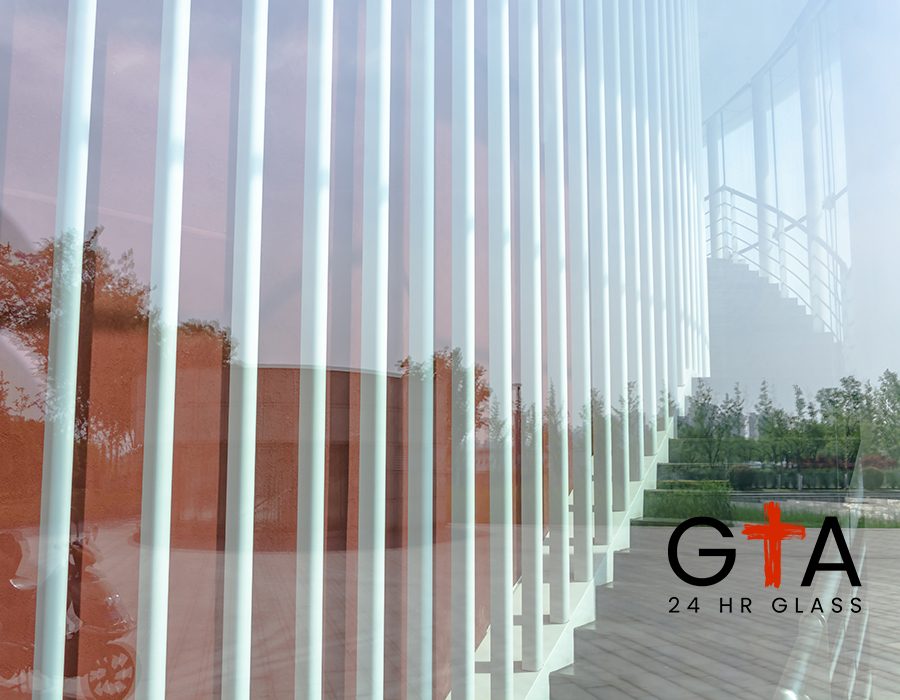 Modern glass silhouettes on modern building.