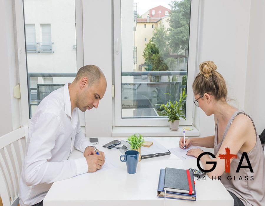 two-businesspeople-working-office